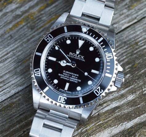 rolex submariner 14060m price.